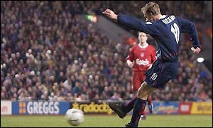 Dennis Bergkamp scores