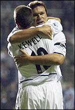 Mark Viduka is congratulated by Harry Kewell after scoring for Leeds
