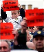 Leeds fans protest against the clubs policy of selling players to clear debts