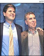 Steve Case and Gerald Levin at the announcement of the AOL Time Warner merger