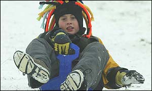 Angus Joyce, 10, uses a sledge in Wandlebury, Cambridge