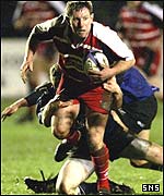 Borders scrum-half Gary Armstrong breaks free