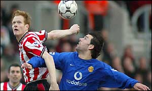 Svensson and Van Nistelrooy compete for a header