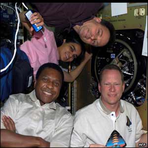 Clockwise from bottom right: David Brown, Michael Anderson, Kalpana Chawla and Ilan Ramon