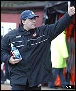 Dundee United boss Ian McCall gives a thumbs up to the crowd