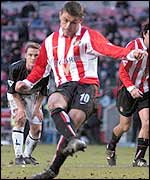 Kevin Phillips steps up to score a penalty