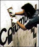 Repair work to Columbia's tiles