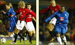 Birmingham's Robbie Savage and Stern John are held off by David Beckham and Juan Veron