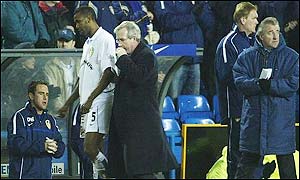 Radebe is replaced by Michael Duberry after half-an-hour of play