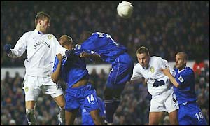 Bakke heads home a Harte cross to seal a 2-0 win for Leeds and a place in the FA Cup fifith round