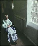 Elderly person in wheelchair