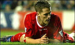 Liverpool's Michael Owen rues a missed opportunity