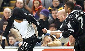 Crystal Palace's Julian Gray celebrates opening the scoring at Anfield