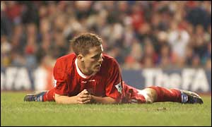 Liverpool's Michael Owen rues a missed opportunity