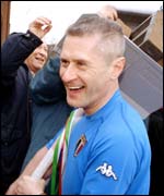 Mr Stitt with a builder's hod full of bricks. Photograph by Martin Figura. Courtesy BCA Gallery 