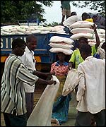 Sacks of food aid being unloaded in Malawi
