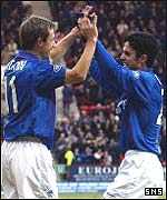 Neil McCann celebrates with Mikel Arteta