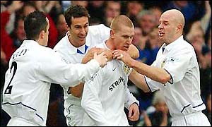 Johnson celebrates with his delighted team-mates