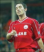 Phil McGuire rues his penalty miss