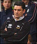 Derby manager John Gregory watches from the Fratton Park sidelines