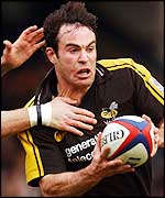 Fraser Waters tries to escape the Irish defence