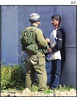 A Palestinian arrested after an attack by gunmen on an Israeli army post in Gaza