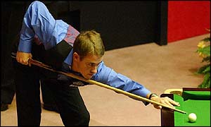 Hendry concentrates as he lines up a pot