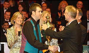 Mark Williams collects the Benson and Hedges Masters title