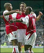 Arsenal players celebrate Thierry Henry's goal at Newcastle