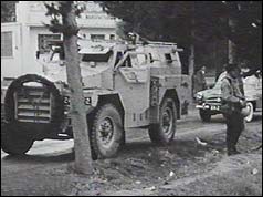 British soldier beside jeep