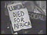 Placard saying Lumumba died for Africa