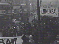 Banner-waving demonstrators walked down Oxford Street