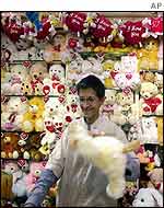 Shopkeeper with Valentine's Day goods in Bombay