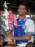 SC Villa's skipper Edgar Watson with the Cecafa trophy