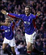 Craig Moore celebrates with Rangers