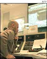 A Saudi security official monitors the holy shrines in Mecca 