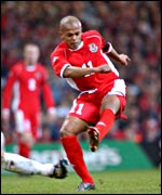 Wales striker Rob Earnshaw shoots