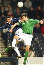 Gary Breen challenges Steven Thompson