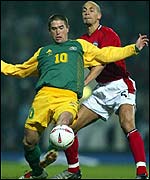 Rio Ferdinand challenges Australia's Harry Kewell