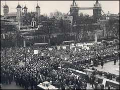 Miners march with Tower Bridge and the Tower of London in background