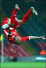Robert Earnshaw celebrates scoring for Wales