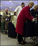 Passengers queuing at Gatwick