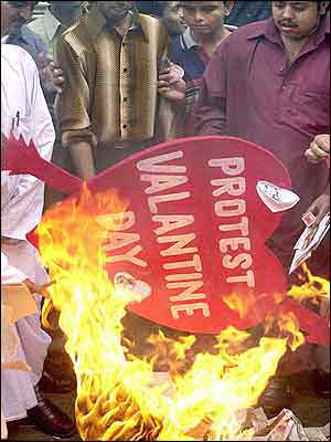 Supporters of a right-wing party in India burn a Valentine's Day placard in Calcutta.