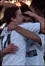 Marc Richards and Roberto Martinez celebrate Swansea's first goal