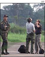 US officials on a runway in Colombia