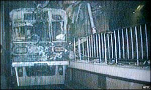 A train car in a blackened tunnel