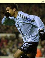 Nigel de Jong celebrates his goal against Arsenal