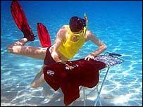 A competitor tries to prove how crazy their ironing is