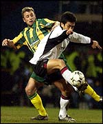 Fulham's Junichi Inamoto tussles with West Brom's Ronnie Wallwork 