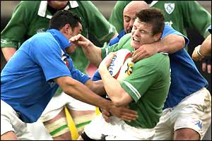 Brian O'Driscoll of Ireland is tackled by Carlo Festuccia of Italy